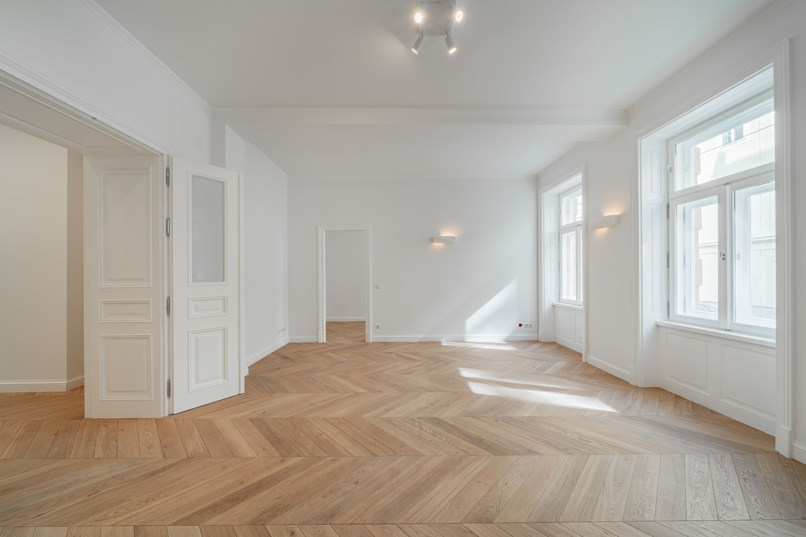 Sanierung mit Stil: Die hochwertig revitalisierten Altbauwohnungen der 3SI Immogroup bieten Qualität und Eleganz in jedem Raum.