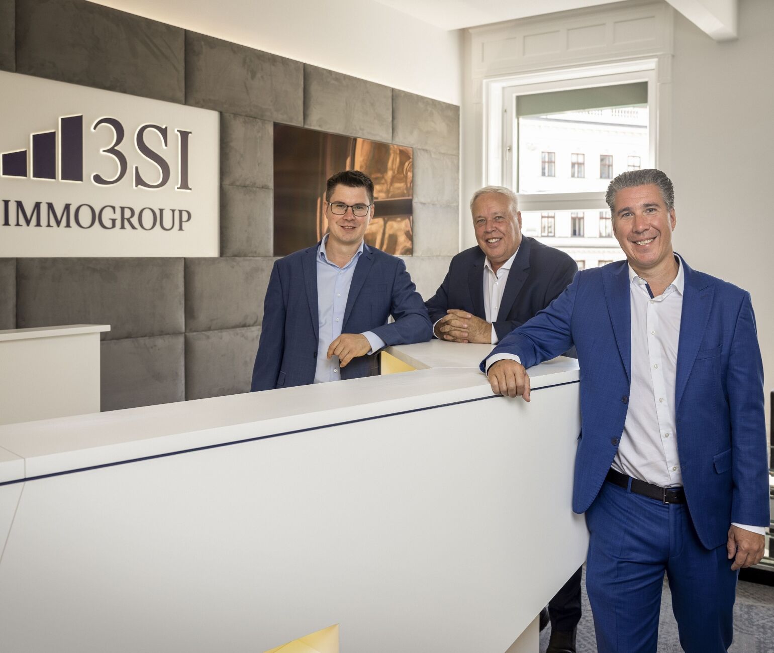 Seit 20 Jahren erfolgreich am Wiener Immobilienmarkt: Michael, Harald und Claus Schmidt im neuen Firmensitz in der Tegetthoffstraße, 1010 Wien.